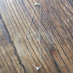 White gold and gem necklace